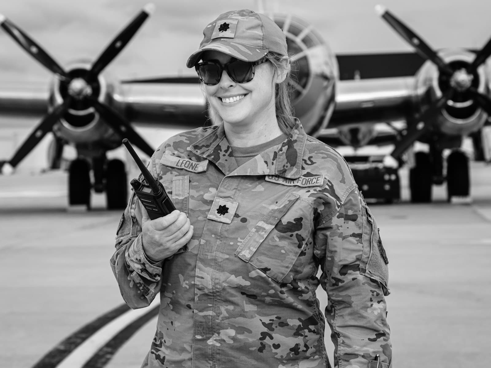 An airman on the flight line beside an aircraft